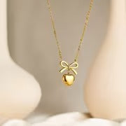 Gold Bow Heart Necklace